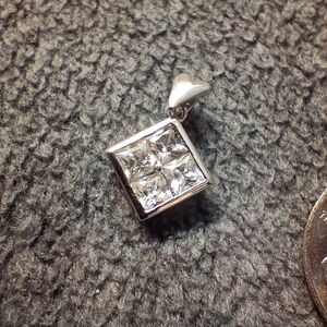 Elegant Silver Pendant with Clear Stones